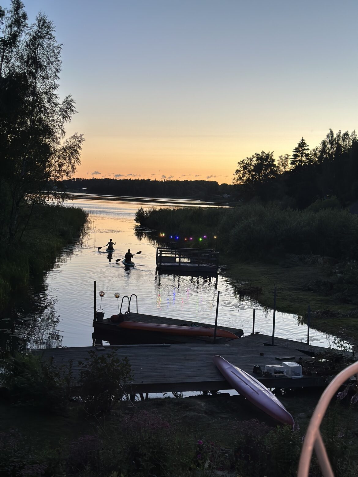 Flen, solnedgång, kajaker